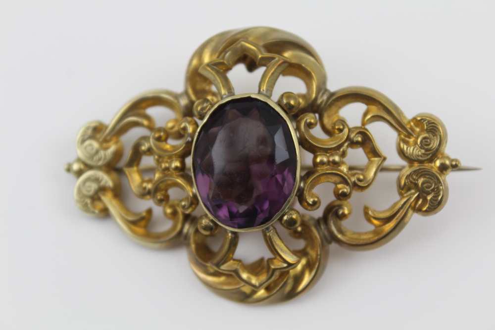 A VICTORIAN PINCHBECK BROOCH set central amethyst colour stone, together with a seed pearl set and a - Image 3 of 6