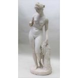 A 19TH CENTURY MARBLE STATUE OF VENUS, after the antique, naked, standing beside a tree stump,