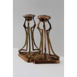 A PAIR OF ART NOUVEAU DESIGN COPPER AND BRASS CANDLESTICKS, 18cm high