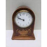 A MAHOGANY ARCH TOP MANTEL CLOCK, marquetry inlaid decoration, white enamel dial with Arabic