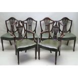 A HARLEQUIN SET OF SIX SHERATON DESIGN MAHOGANY DINING CHAIRS comprising a pair of open arm and four