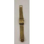 AN OMEGA LADYMATIC 18CT GOLD CASED WRISTWATCH with 18ct gold bracelet strap, gross weight; 56.9g