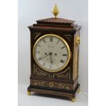 A REGENCY MAHOGANY BRACKET CLOCK, the 8-day twin fusee striking and repeating movement with domed