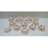 A LATE 19TH / EARLY 20TH CENTURY FLORAL CHINTZ DESIGN DECORATED PART TEA SERVICE comprising; two