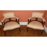 A PAIR OF 19TH CENTURY SHOW WOOD FRAMED TUB CHAIRS