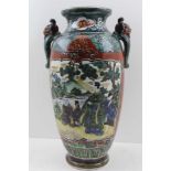 A 20TH CENTURY JAPANESE CERAMIC VASE, moulded mask handles, enamelled to one side with courtly