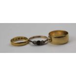 A BROAD PLAIN 18ct GOLD WEDDING BAND, size; 'M 1/2' a small 22ct GOLD WEDDING BAND size; 'H' and a R