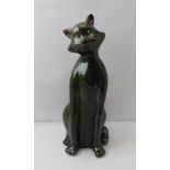 A STUDIO POTTERY LOUIS WAIN STYLE CAT, green glazed stoneware in seated position, 39cm high