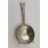 A CHINESE WHITE METAL TEA STRAINER with bamboo decorated handle, 17g