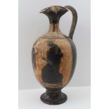 A GREEK TERRACOTTA 'ATTIC' OLPE / EWER, possibly 5th century BC, pinched rim forming a pouring spou,