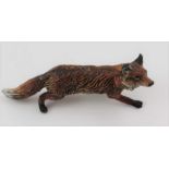 AN AUSTRIAN TYPE COLD PAINTED BRONZE STALKING FOX, 10cm long