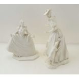 TWO 20TH CENTURY GERMAN PORCELAIN FIGURES in the white, one features a dog ripping the figure's