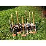 A VINTAGE LAWN CROQUET SET comprising; 6 mallets, 5 hoops, 2 pegs and 2 balls, in pine carrying box
