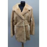 A RED FOX FUR JACKET supplied by 'Brian's Furs', of Regent Street, Leamington Spa, believed to be