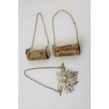 YAPP AND WOODWARD A MID-19TH CENTURY SILVER "PORT" LABEL of cast vine leaf form, with chain,