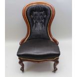 A VICTORIAN MAHOGANY SPOON BACK SALON CHAIR on cabriole fore supports, with castors, black horsehair
