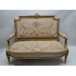 A FRENCH LOUIS XVI STYLE CANAPE SOFA, gilt gesso open arm frame, crested back, acanthus leaf