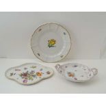 A 20TH CENTURY NYMPHENBURG PORCELAIN TWO HANDLED SERVING DISH, floral decorated, 22cm x 15cm,