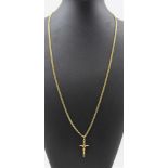 AN 18CT GOLD CRUCIFIX ON AN 18CT GOLD CHAIN, both stamped .750, combined weight; 16.4g