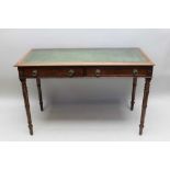 A MAHOGANY WRITING TABLE, green tooled leather top over two drawers, with brass handles, on ring