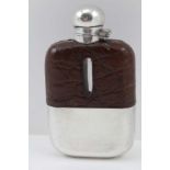 A JAMES DIXON AND SONS HIP FLASK having silver-plated removable cup base, crocodile leather