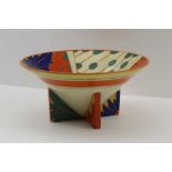 AFTER CLARICE CLIFF A CONICAL CERAMIC BOWL, hand painted decoration, raised on cruciform stand,