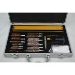 A BOXED MODERN MULTI CALIBRE CLEANING KIT, for shotguns and rifles (unused)