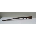 A 12 BORE SIDE BY SIDE HAMMER SHOTGUN WITH SIDELOCK ACTION made by Frederick Williams of London &