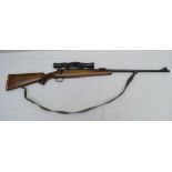 A .375 H&H ACTION RIFLE, made by Mauser No. 68924, with Schmidt & Bender 4 x 36 telescopic sight, in