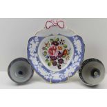 A 19TH PORCELAIN LEAF FORM SERVING DISH, pink ribbon handle, hand painted floral bouquet to the