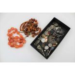 A COLLECTION OF AMBER COLOURED BEADS and assorted COSTUME JEWELLERY