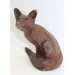 MICHAEL STOREY A LATE 20TH CENTURY BRONZE SEATED FOX, brown patinated finish, signed to the tip of