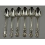 PETER AITKEN A SET OF SIX SILVER DESSERT SPOONS, with monogrammed scallop handles, Glasgow 1870,