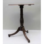 A 19TH CENTURY MAHOGANY RECTANGULAR TOPPED TABLE, on turned column and three outswept legs with