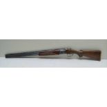 A BAIKAL OVER & UNDER 12 BORE NON EJECTOR SHOTGUN, model IJ27, SNH04074 double trigger, 2 3/4