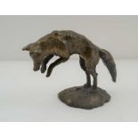 A LATE 20TH CENTURY BRONZE LEAPING FOX, on ground work base, 7cm high