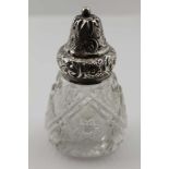 S.G. JACOBS A CUT GLASS SUGAR CASTER with embossed silver cover, Birmingham 1906, 12cm high