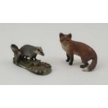 TWO COLD PAINTED CAST METAL ANIMALS; fox and a badger, fox 3cm high, together with a CORKSCREW