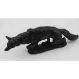 A 20TH CENTURY CAST BRONZE STALKING FOX, on ground work base, 21cm long