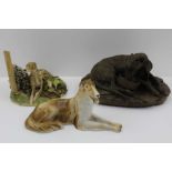 A 'ROYAL DUX' POTTERY RECLINING BORZOI, factory marks and impressed No.328, 9cm high, together with;