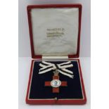 VAUGHTONS LTD A 'LEAGUE OF MERCY 1898' SILVER GILT & ENAMEL MEDAL, with pin fastening and ribbon,