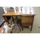 A MID 20TH CENTURY INSTITUTIONAL OAK FINISHED DESK with half column of three drawers with pull-out