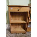 A PINE SET OF OPEN SHELVES with single drawer to the top