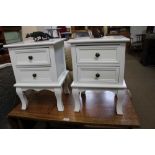 A PAIR OF WHITE FINISHED LOW BEDSIDE UNITS, fitted two drawers