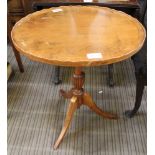 A REPRODUCTION YEW WOOD OVAL TOPPED OCCASIONAL TABLE on reeded baluster column, and three