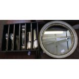 A CANTEEN CONTAINING A SELECTION OF SILVER-PLATED CUTLERY together with a circular plain plate