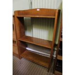 A MODERN OAK FINISHED SET OF OPEN ADJUSTABLE SHELVES