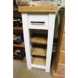 A PART PAINTED SOLID OAK TOPPED UNIT fitted with a single drawer, over open fronted adjustable