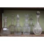 SIX VARIOUS DECANTERS & STOPPERS