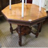 A LATE 19TH CENTURY OCTAGONAL TOPPED CENTRE TABLE on turned legs, united by a galleried undertier